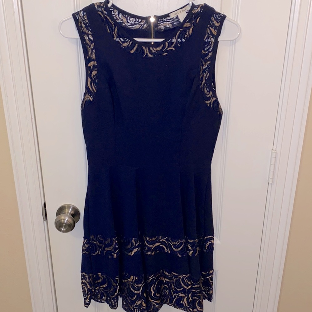 Form fitted dress with flowy skirt bottom